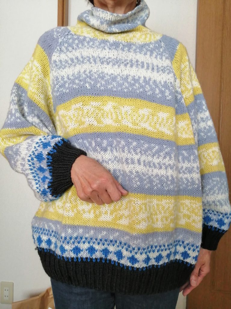 編み込み模様のセーター